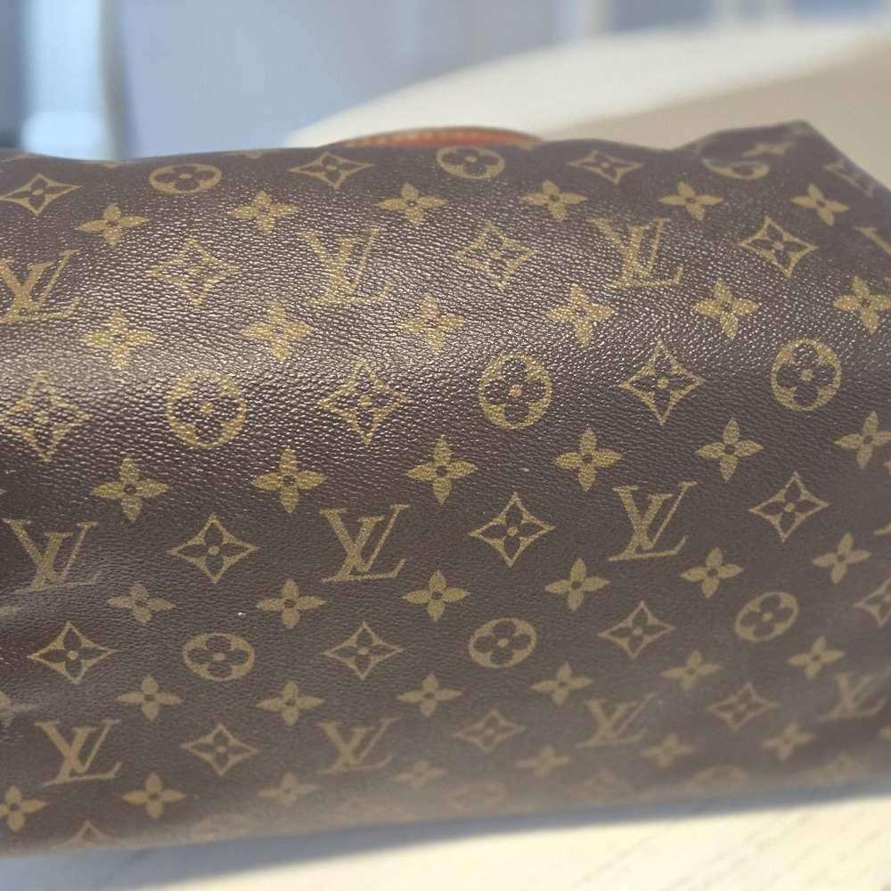 Louis Vuitton Monogram Brown Clutch